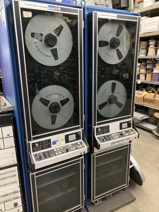 Giant reel-reel tape recording or playback devices of some sort.